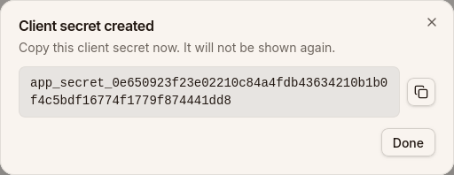 Client secret created modal showing the generated app secret.